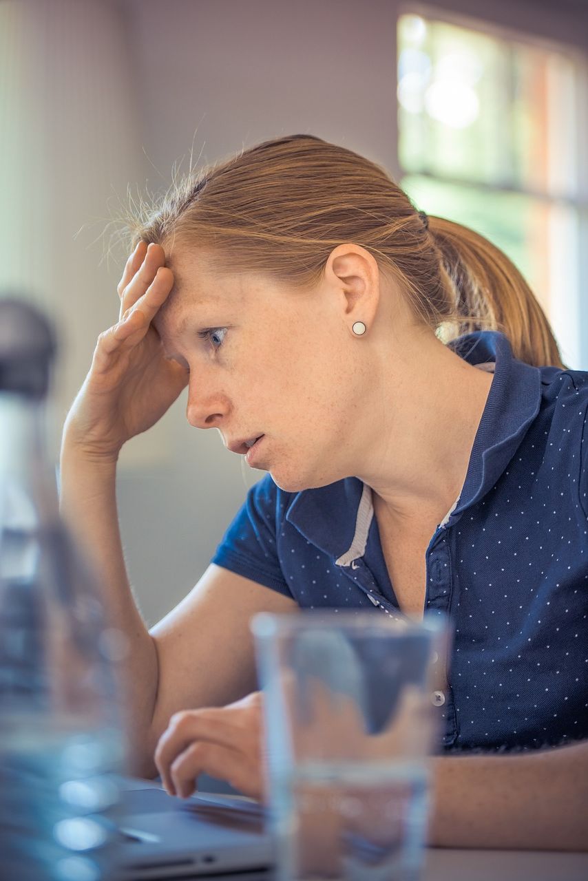 woman looking stressed